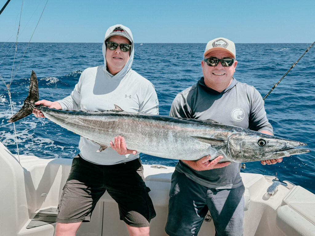 Two Anglers with a Wahoo Offshore